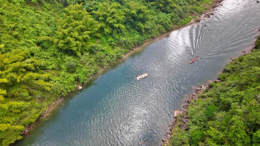 Jewel Of Fiji: Boat, Raft & Waterfall Culture Tour w/Lunch - Cruising upriver by motorized long boat